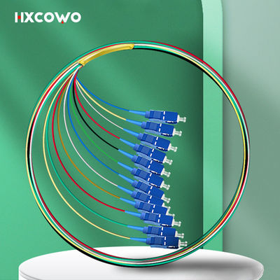 comprar Modo óptico G657A 0,9 mm G652D del SC UPC de la coleta de la fibra del color de FTTX HXCOWO 12 Fabricación en línea